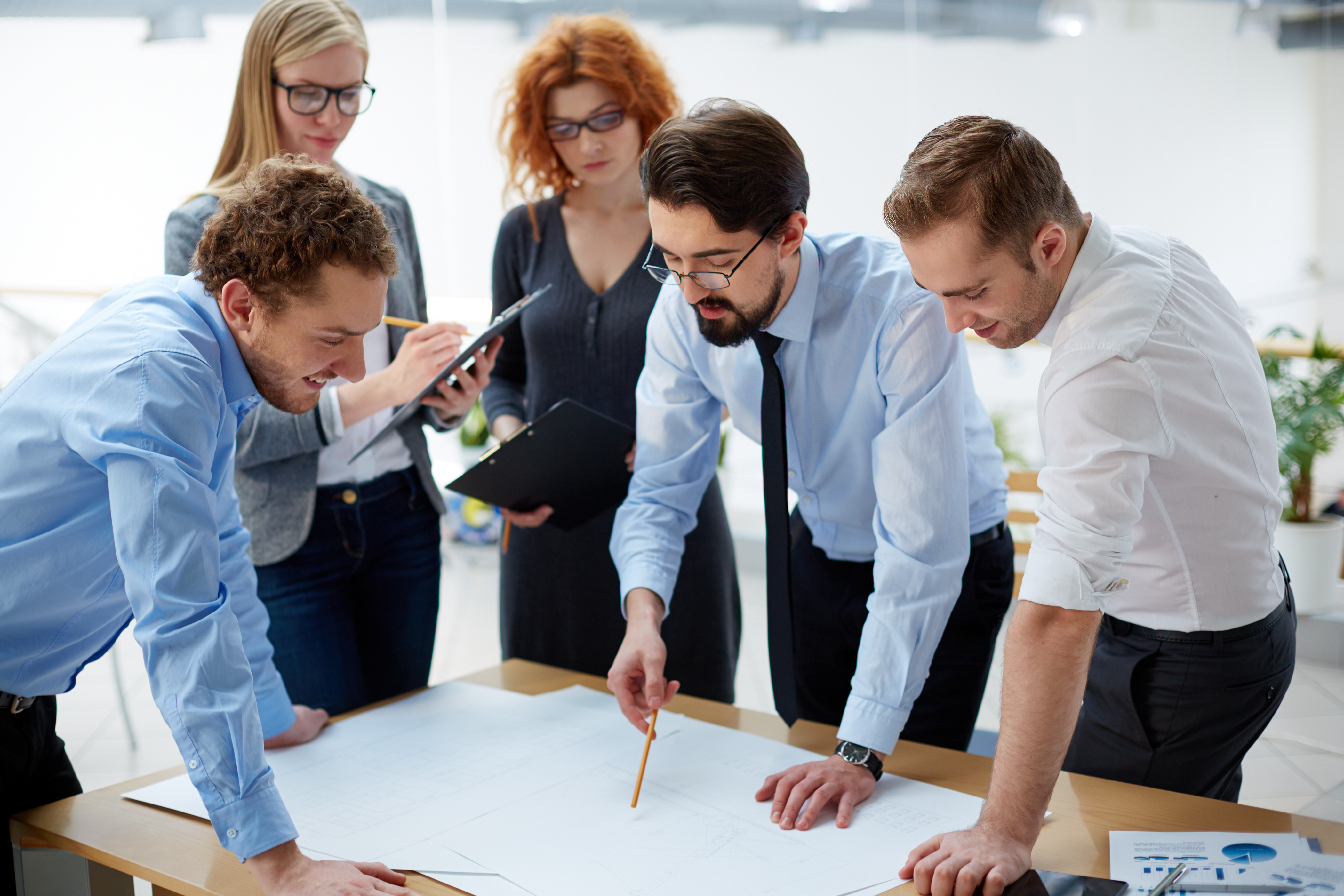 An image of young individuals planning.